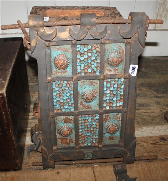 Two hanging plaques and a similar ornament